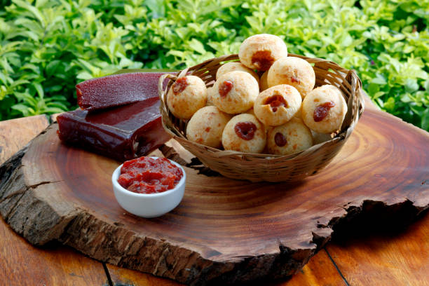 Brazilian snack cheese bread, pao de queijo stuffed with guava