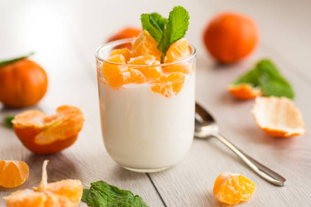 Light fruit dessert with tangerines and mint.